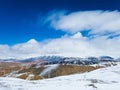 Snow mountain white clouds and beautiful sunshine Royalty Free Stock Photo